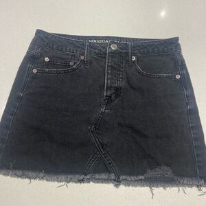 American eagle black denim mini-skirt with button fly. Size 2